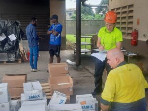 AB Capital Logistics staff discussing operations